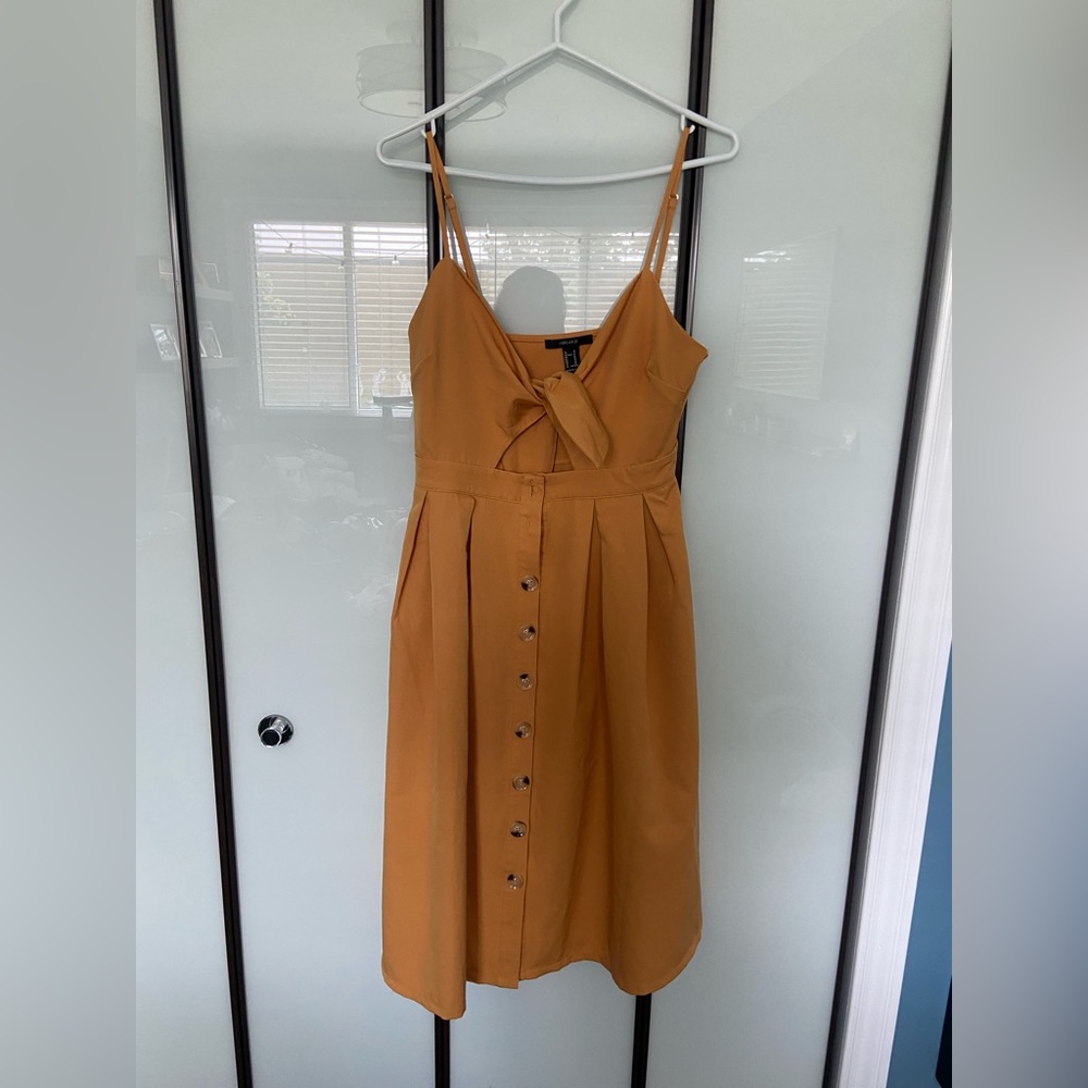 Cute summer yellow dress with knot in front